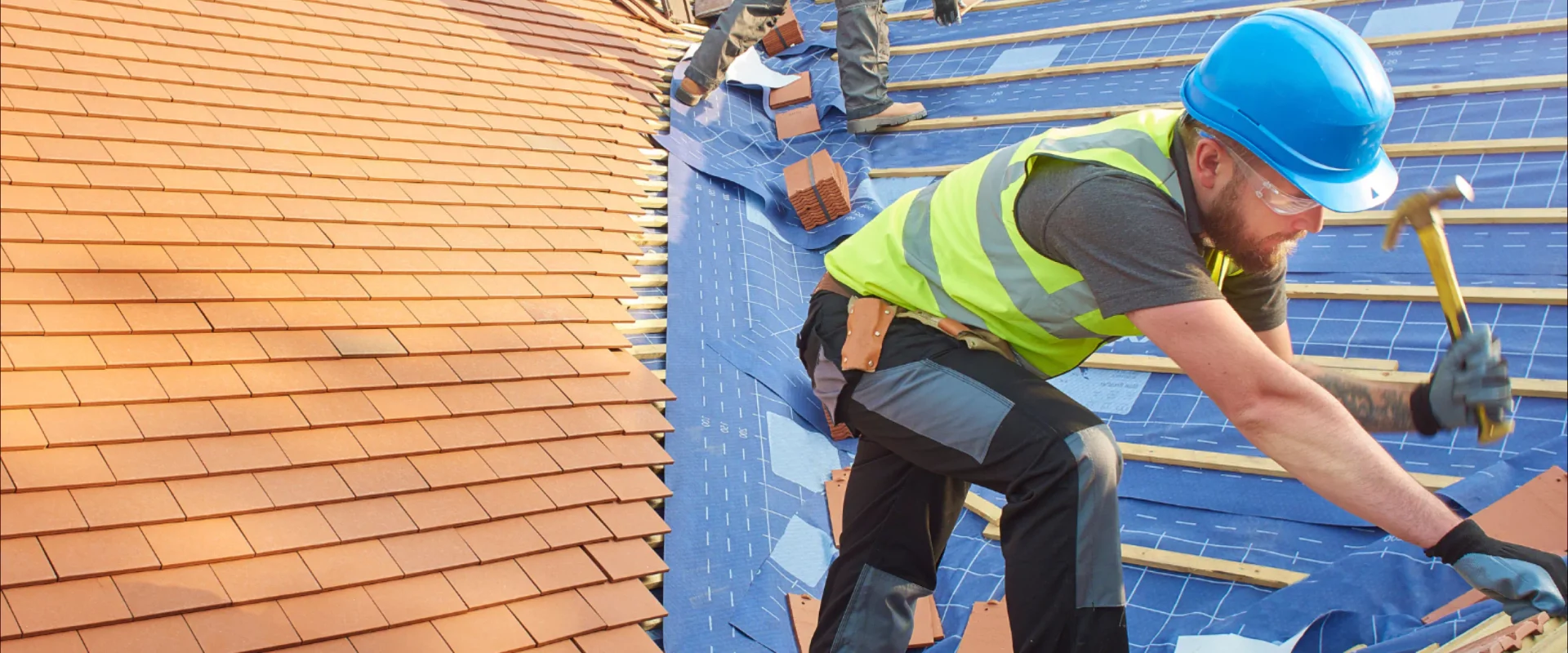 two contractors installing roof