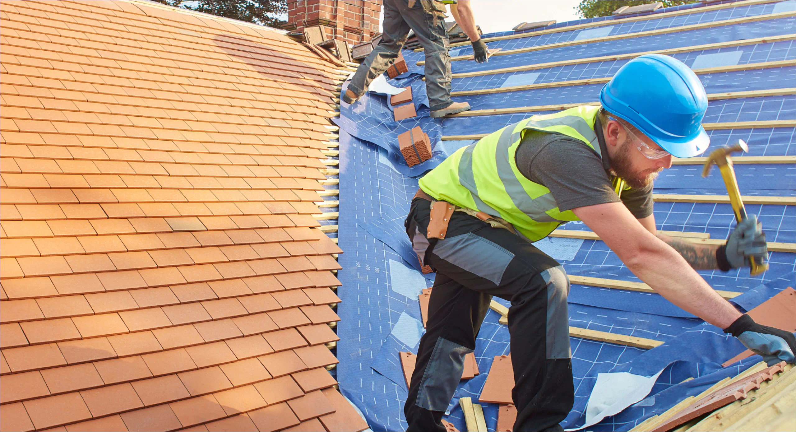 two contractors installing roof